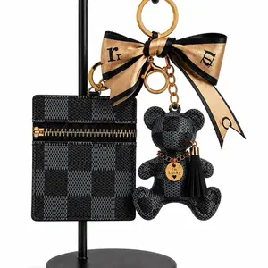 Earbud holder with matching teddy bear