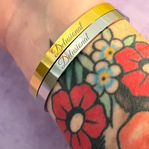 Delusional bangle bracelet