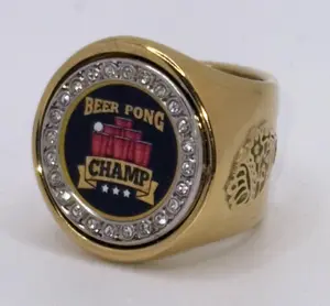 The BEER PONG CHAMP deCAPitator ring bottle cap & can tab opener, busts open your favorite beverage with a flick of the wrist. Golfing merchandise; Golf gift; PGA merchandise