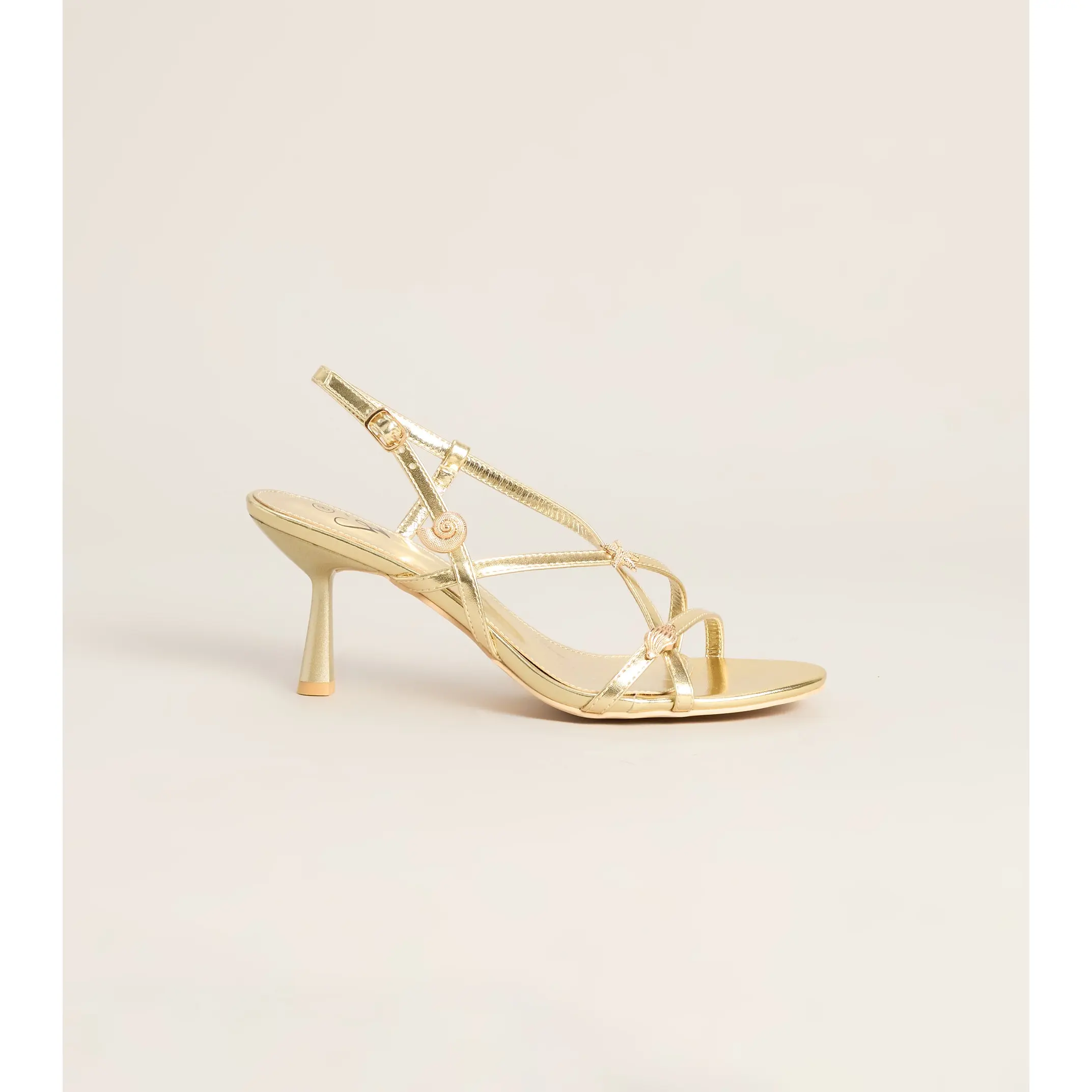 On Vacay Sea Shell Charm Metallic Heels