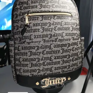 Juicy Coutures Authentic Pink Floral Bow Bag with Adjustable Strap and Stylish Design  #stayfaded #stayfadedbrand #reseller styles choose 1 -5