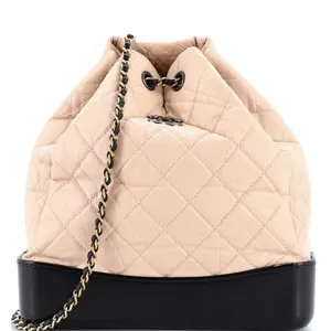 Pre-owned CHANEL Leather Backpacks Gabrielle Backpack Quilted Aged Calfskin Medium by Rebag