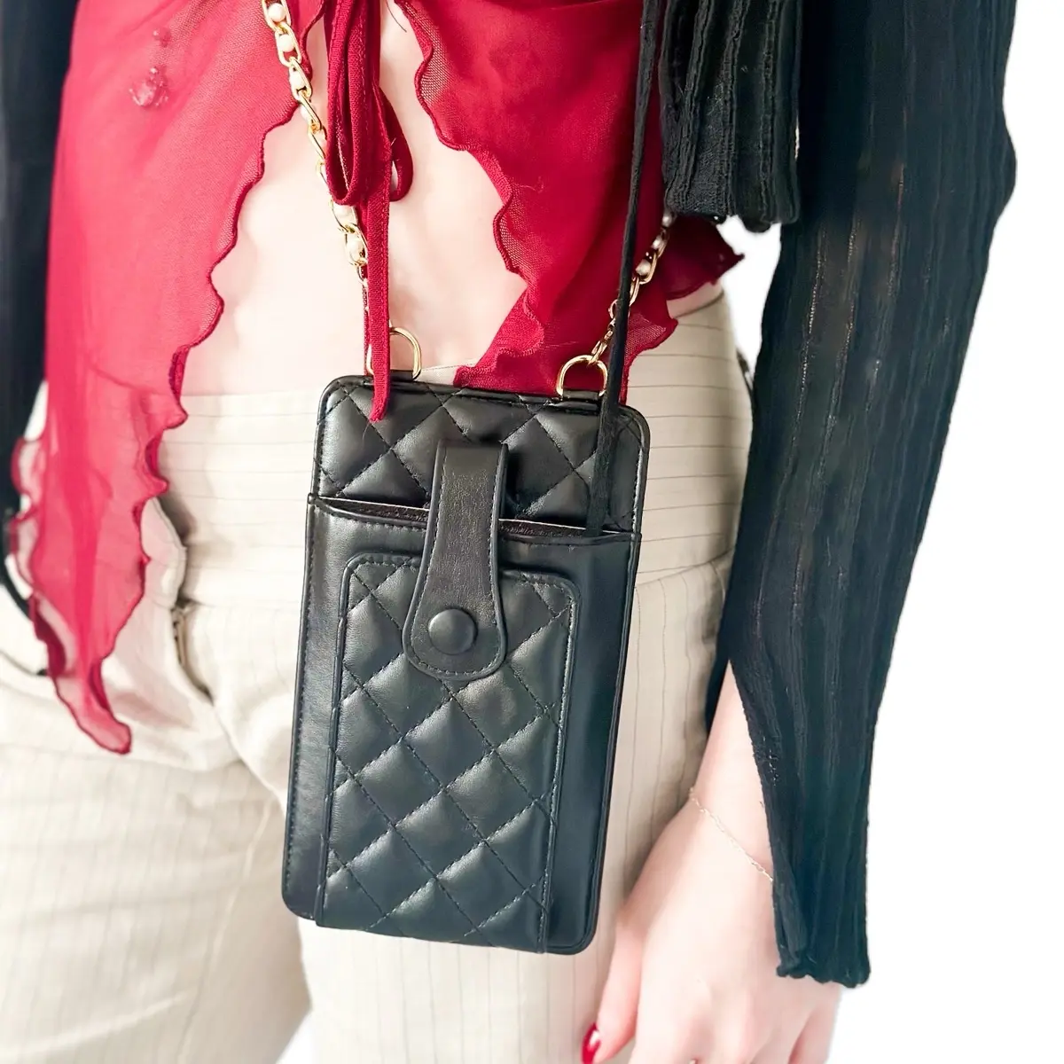 The “Everything” black pouch. With pearl gold chain. Can hold phone and credit cards. black party dual pouch