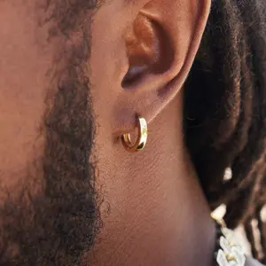 Best-Selling Polished Round Huggie Earrings in Yellow and White Gold