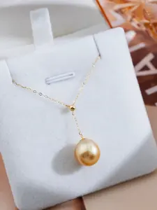 Fashionable Adjustable Y Chain Pearl Pendant, 10-11mm Teardrop Shape, Slight Imperfections, Sea Water South Sea Gold Pearl