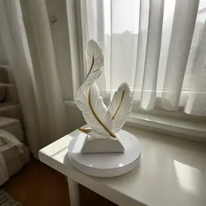 A Minimalist And Luxurious Decorative Feather Ornament Suitable for Home, Bedroom, And Living Room, Perfect As a Housewarming Gift
