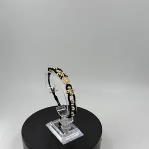 Pulsera tejida artesanal  Oro laminado   Nuestras pulseras son ajustables