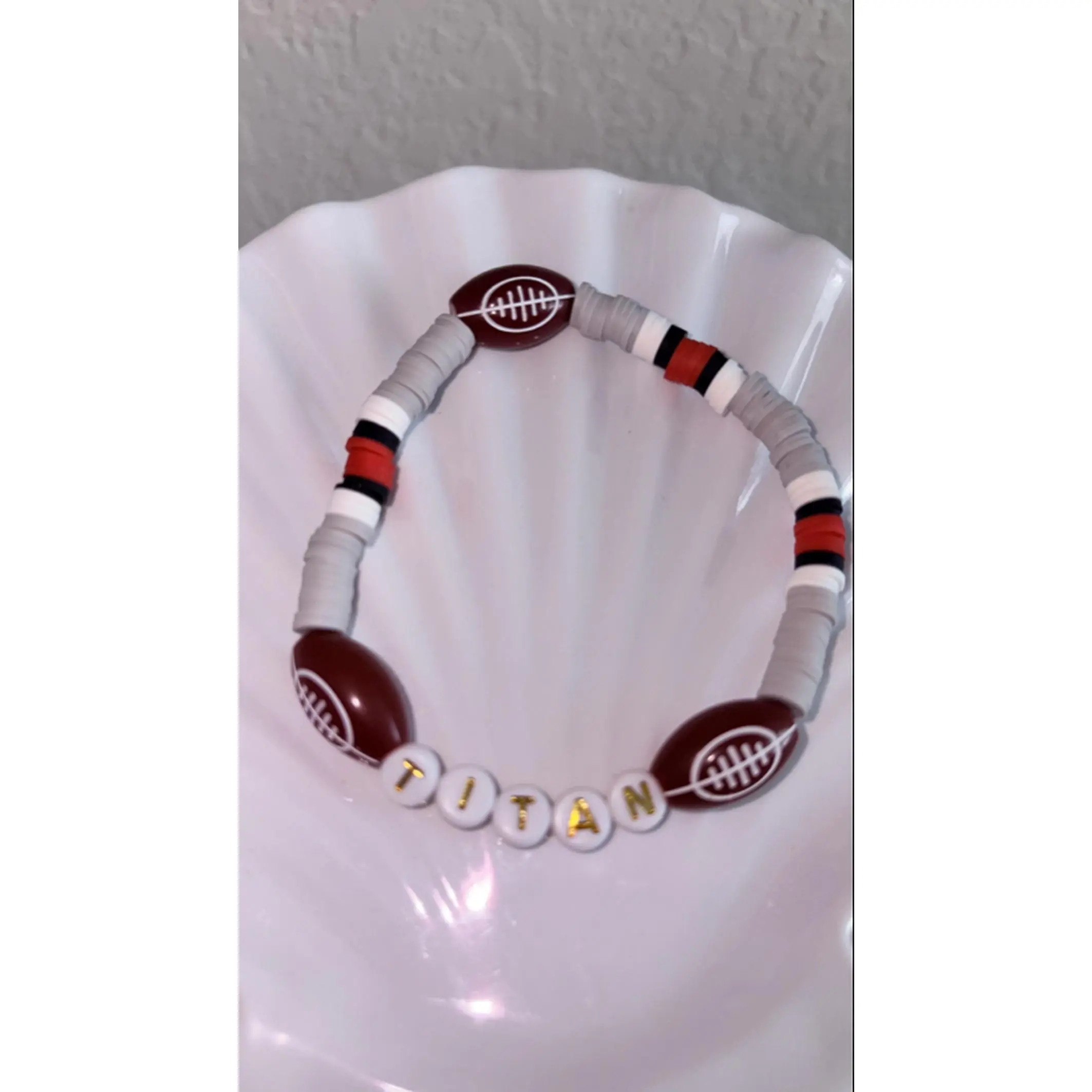 Customized Football Team Bracelet with Red and White Beads and "TITAN" Engraving