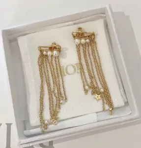 Pre-owned Dior Star & Pearl Fringe Drop Earrings in Gold Tone Metal