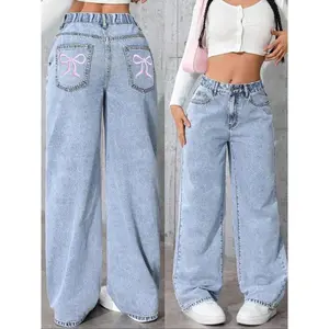 Girls’ washed denim jeans with an embroidered bow design, a loose elastic waistband, suitable for all seasons, cute style GARMENTARY
