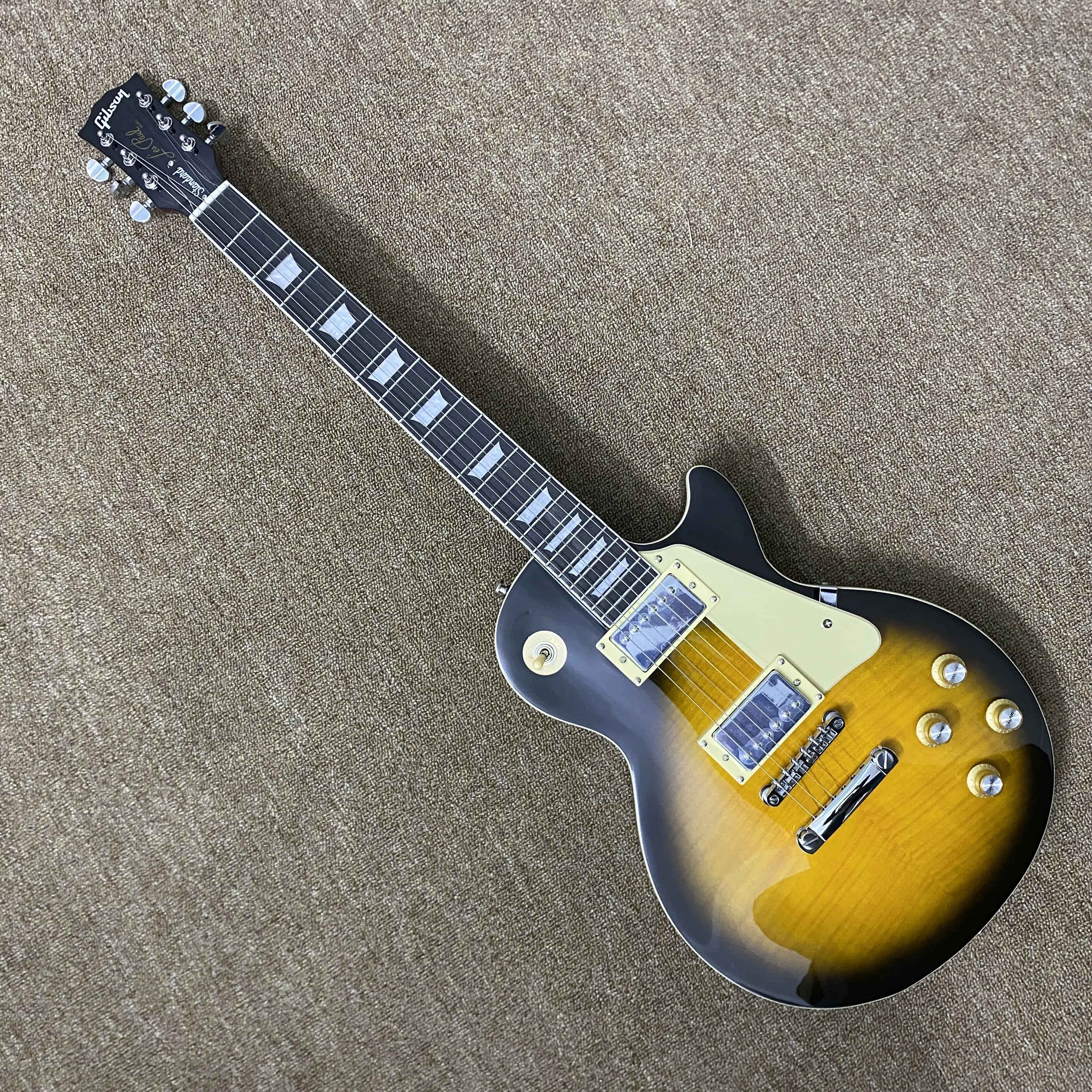 LP electric guitar, yellow mahogany body, chrome hardware, rosewood fretboard, 22 frets LP electric guitar, yellow mahogany body, chrome hardware, rosewood fretboard, 22 frets