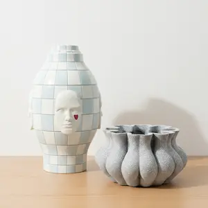 Checkerboard face and heart pattern vases or uniquely textured grey flower pots | Eye-catching home decor garden ornaments and gifts that instantly elevate the artistic ambiance and make every glance a focal point.