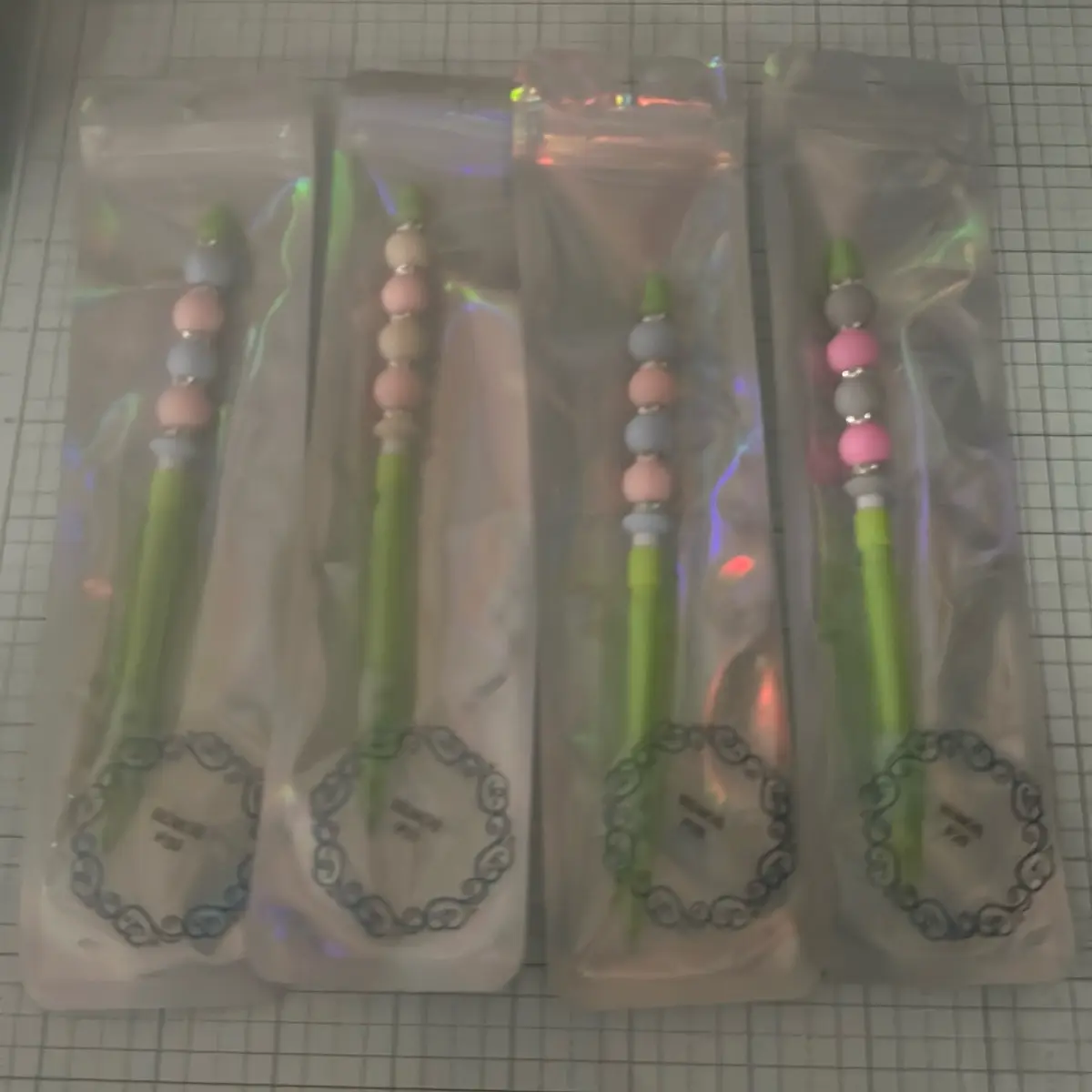 Beaded mechanical pencil