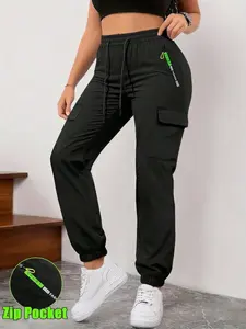 Women’s cargo jogger pants with zippered pockets for spring/summer, available in 1-pack or 3-pack. Featuring a fashionable large pocket design and an elastic waistband with an elastic drawstring waist, these are slim-fit long pants suitable for casual out