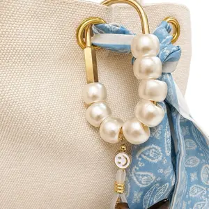 Smiley Bag Charm & Sunglass Holder