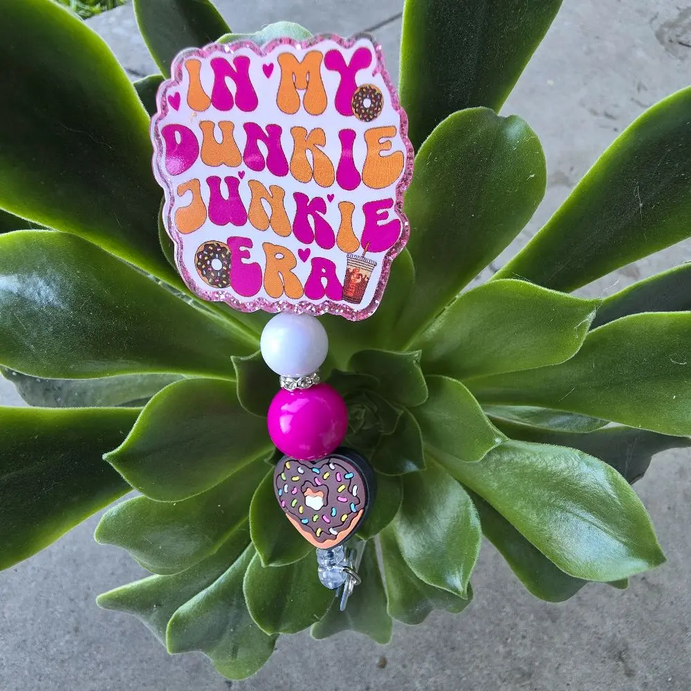 In my Dunkie Junkie Era badge reel