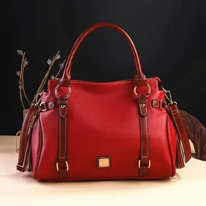 Vintage women's crossbody bag with adjustable shoulder strap and top handle - red/black Boston bag, gold-tone hardware, zipper closure, tassel details and polyester lining, an elegant piece suitable for everyday casual use