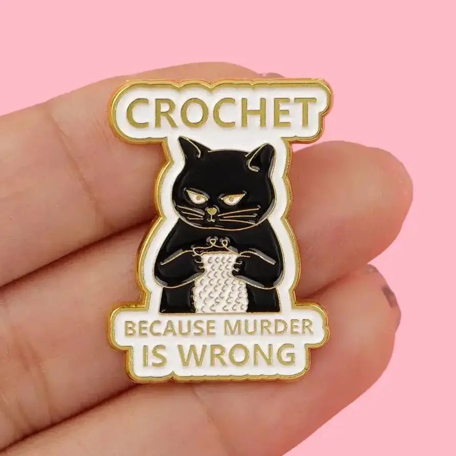 Stabby Tabby Crochet Therapy Enamel Pin – “Because Murder Is Wrong”