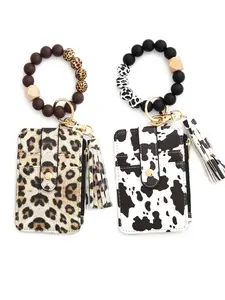 #Boho #Viral Leopard Print Wearable Wallet Bracelet! Your Keys, Cards, & Style in One. Beaded & Tassel Keychain Holder for a Hands-Free Boho Vibe. Dual Pouch Wristlet