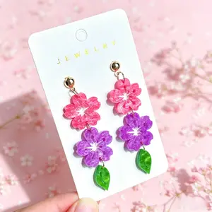 A variety of gradient color flower earrings, new summer model made of acrylic material, fresh and cute, crafted from lightweight acrylic, comfortable to wear, and not tiring even after prolonged use
