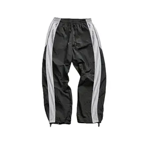 Men's vintage sporty contrast-color casual pants with black and gray panels, loose fit, drawstring ankle cuffs, unisex design suitable for everyday streetwear, sports, and commuting; comfortable, breathable, and stylish, these high-street retro-inspired p
