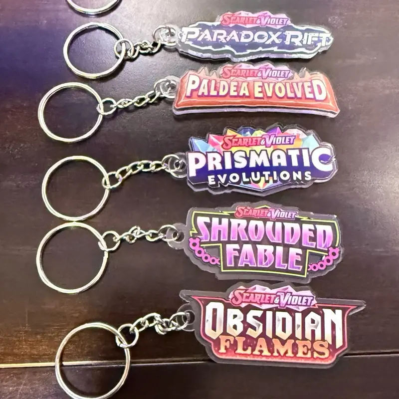 Pokémon Set Binder Keychains - Scarlet & Violet Series - Paradox Rift, Paldea Evolved, Prismatic Evolutions, Shrouded Fable, Obsidian Flames