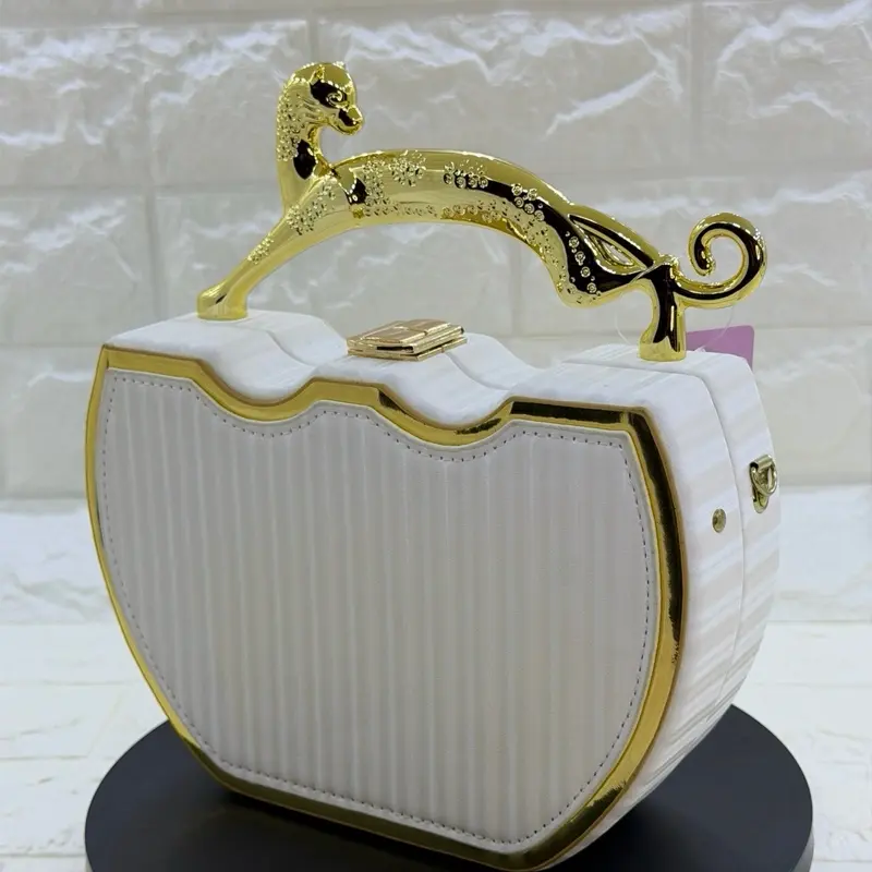 Cream Cheetah Evening Hangbag with Gold Accents and Ribbed Design for Stylish Occasions