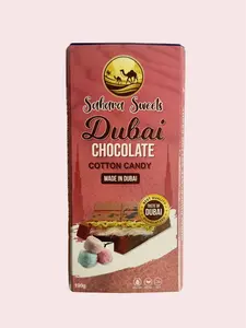 Sahara Sweets Dubai Chocolate Bar - Handcrafted Milk Chocolate with Cotton Candy & Pistachio Filling. Authentic flavors from Dubai