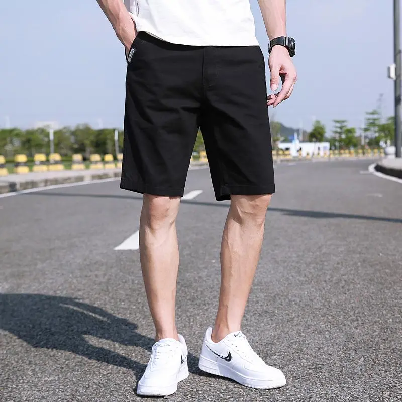 HOMUG Men's Vintage Cargo Shorts, loose-fit knee-length shorts, casual and versatile. The fabric is breathable and skin-friendly, wear-resistant, and anti-pilling. Available in various colors, suitable for spring and summer.