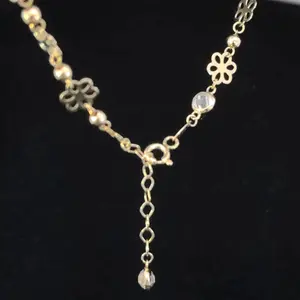 14K Gold Bracelet with Delicate Flower Charms