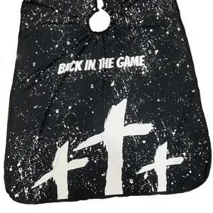 Blessings Barber Cape by Back In The Game. Durable, Hair styling cape for use in BarberShop or at home. Lightweight polyester, adjustable clips and secure buttons for MAXIMUM comfort.