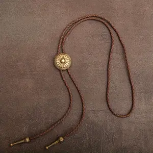 1 piece of retro bolo tie collar rope, in the style of Western cowboys. It is a bolo leather rope necklace with circular patterns and a long necklace.