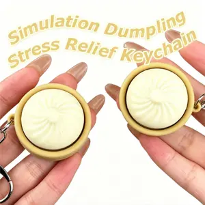 2026 New Style Simulation Mini Dumpling Keychain Fun Keychain Pendant with Pressable Stress-Relief Design Quirky Bag Accessory Mini Toy Charm Pure Mechanical Design with No Batteries Prank Gift Weird Item for Your Best Friend