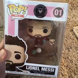 Funko POP MLS Soccer: Inter Miami - Lionel Messi Vinyl Figure with Epic Collectibles Premium Box Protector Included