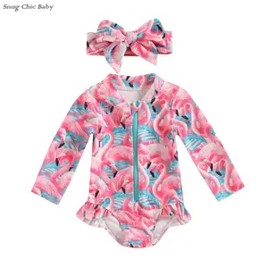 Sweet and adorable long-sleeved sun-protective swimsuit set for baby girls,  design with front zipper and ruffled hem, matching headband, cute flamingo/floral print swimsuit