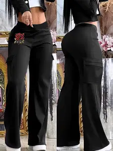 Women's black casual trousers, featuring flap pockets, elastic waistband, and a straight-leg, Fitted fit. Suitable for spring, summer, and autumn wear.  Workwear style. Pants
