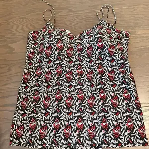 Cotton Fabric Short Kurtha with Red and Black Floral Patterned Design