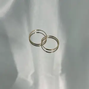 14k Gold Thin and Dainty Hoops with Seamless Closure - Elegant and Minimalist Design