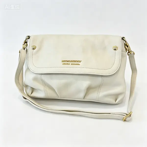 Pre-owned BURBERRY off white pebbled leather fold over flap crossbody bag with gold brand lettering hardware and adjustable strap