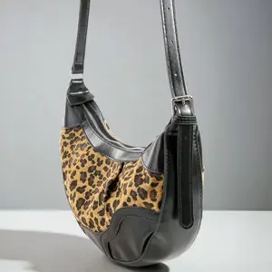 The Wild Edge Leopard Hobo Bag – Studded Faux Leather Shoulder Bag