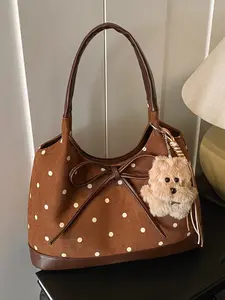 Small niche design polka dot tote bag, bow decoration, plush dog pendant, vintage brown color tone, large capacity shoulder bag, versatile item for daily commuting, Casual Commuter Bag, Trendy Commuter Bag, full of autumn and winter atmosphere
