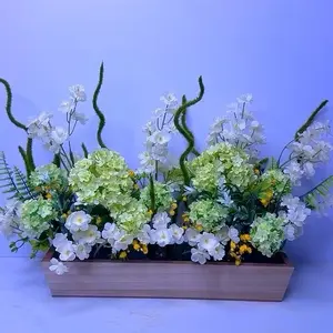 Elegant Floral Arrangement in Wooden Planter with White and Green Flowers for Home Decor