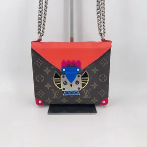 Pre-owned Louis Vuitton leather Crossbody Bags Tribal Mask PM Monogram Canvas Chain Pochette Crossbody Bag Multicolor