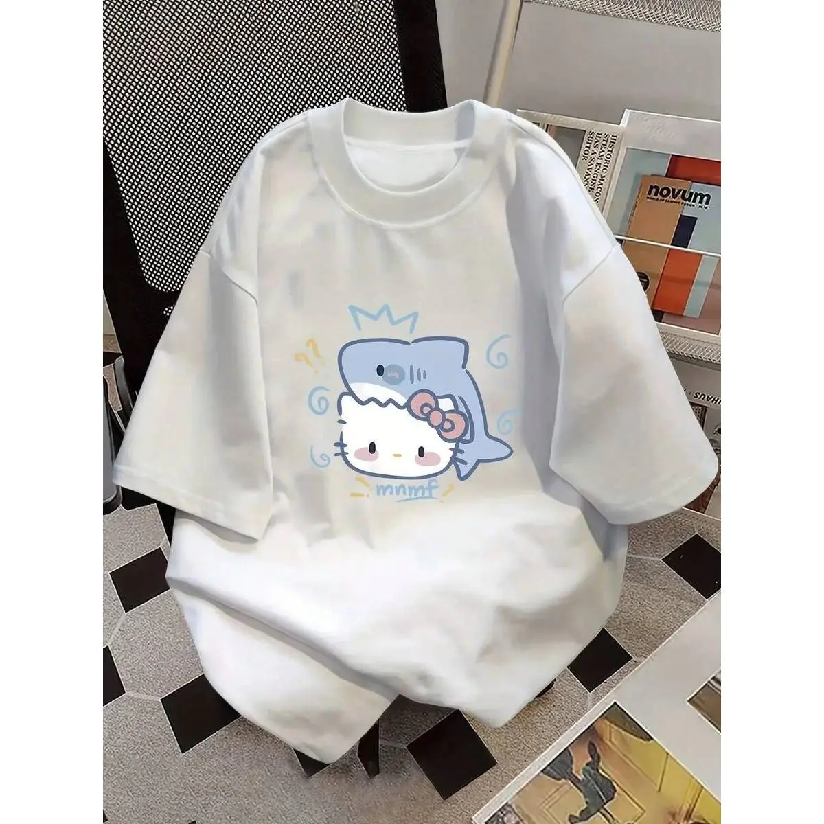 SANRIO Hello Kitty women’s short-sleeved crew neck casual t-shirt with hello kitty print. Made of pure cotton. Machine washable. Suitable for all seasons. Summer wear. Fun, sexy, avant-garde, and personalized design. Opaque fabric.