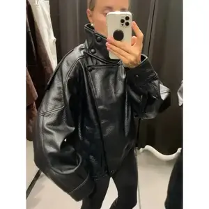 Autumn women's street fashion loose leather jacket long sleeved high neck zipper with pockets asymmetrical retro jacket can be paired with raincoat