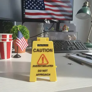 3D Printed Humor Caution Overstimulated Do Not Approach Desk Sign is a novelty office cubicle decor funny prank gift and White Elephant Present cute mini signage to signal boundaries