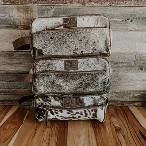 Cowhide toiletry bag for men and women