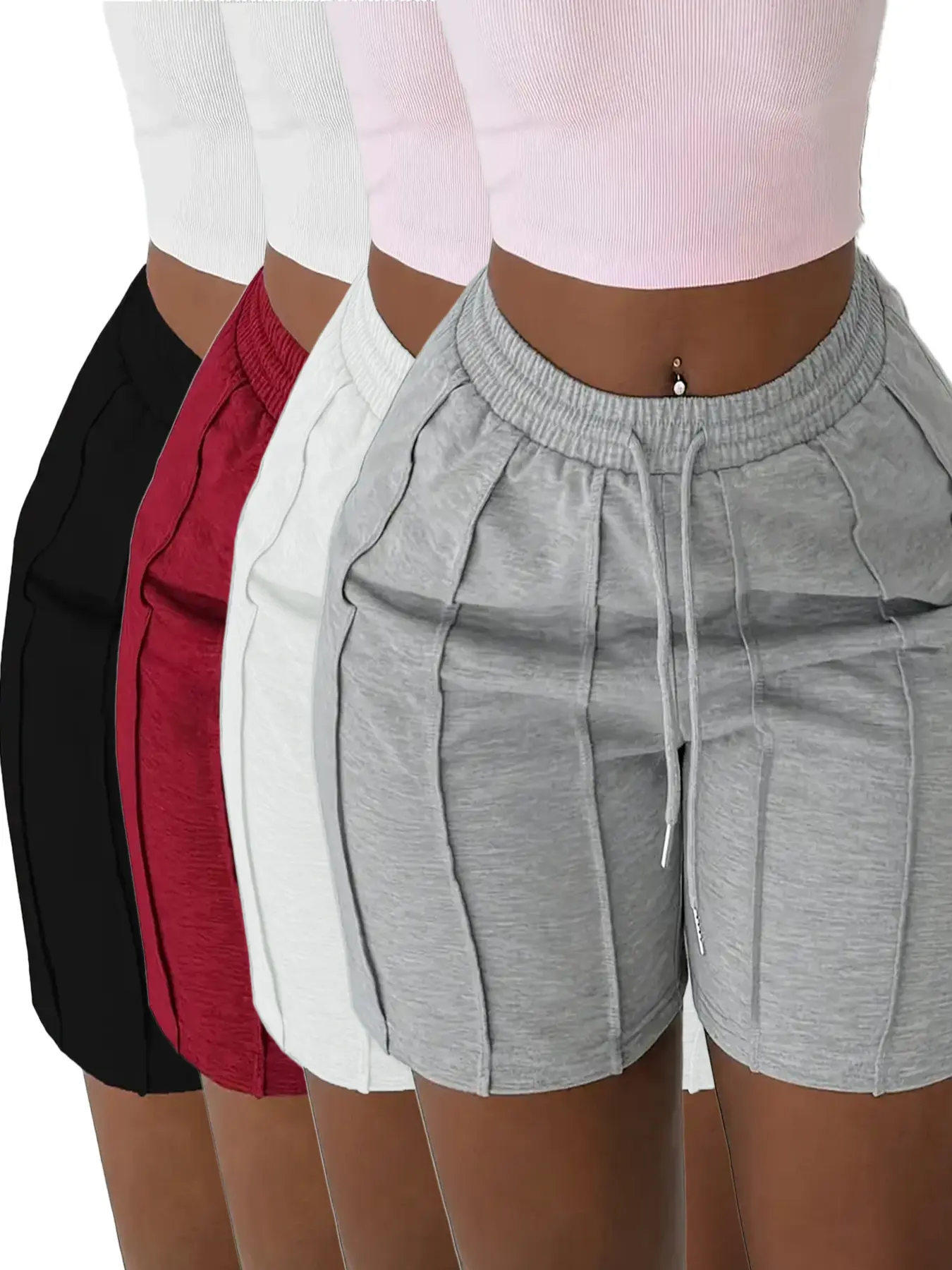 Pack of 4 solid-color drawstring athletic shorts with an elastic waistband, suitable for women’s casual wear in spring, summer, and autumn.