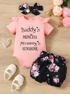 Baby girl pink short sleeved jumpsuit with "Daddy's PRINCESS Mommy's SUNSHINE" lettering ruffled sleeves paired with black printed shorts for a sweet baby outfit