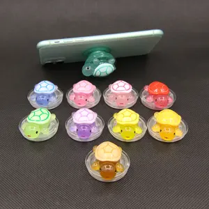 A cute and creative mobile phone holder mini luminous resin turtle design foldable airbag holder anti slip ring, suitable for mobile phone devices and decorations